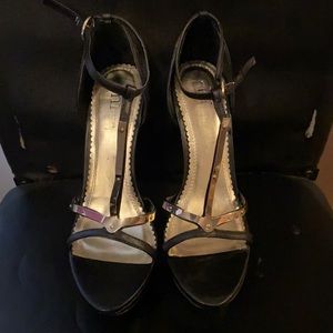 Black and gold platforms